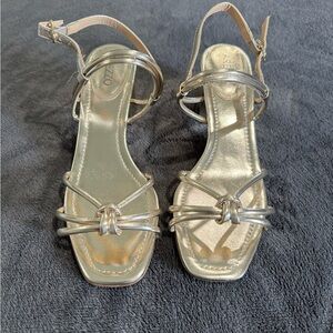 Brand new golden sandals